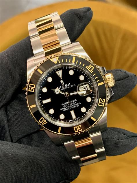 Rolex submariner 18 ct yellow gold